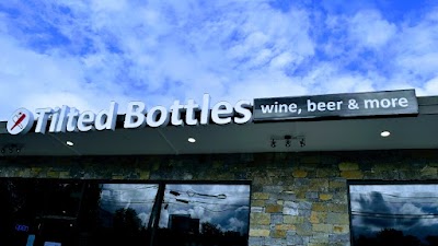 Tilted Bottles Wine Beer And More